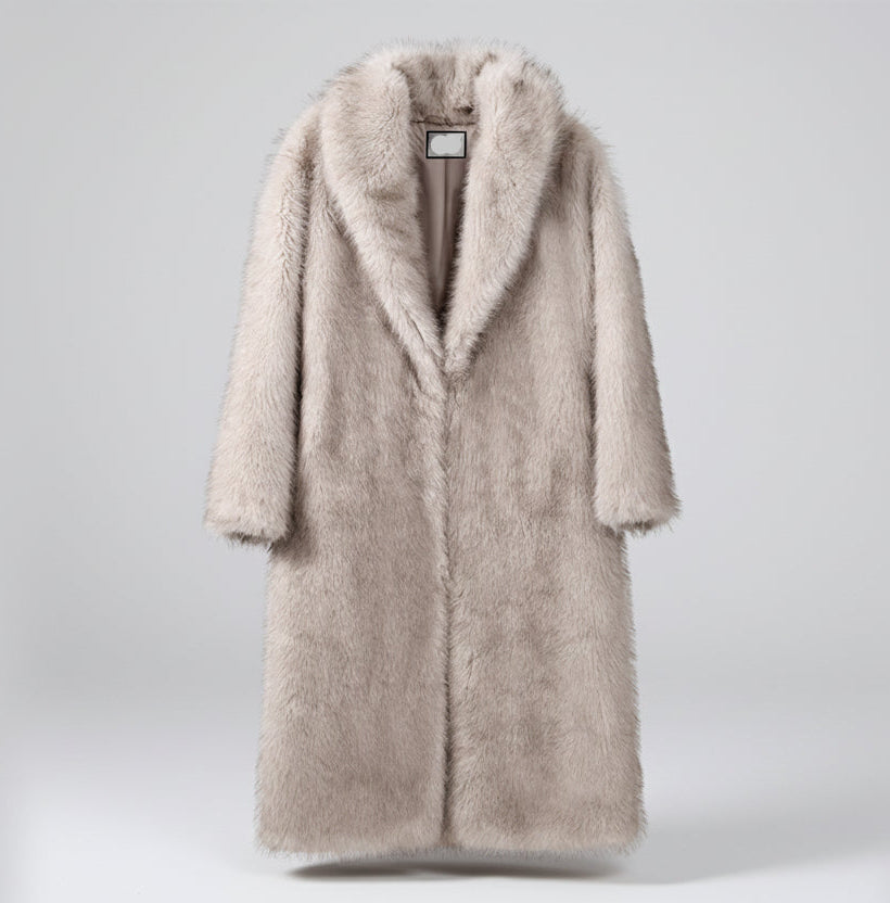 Beige fur coat on a white background