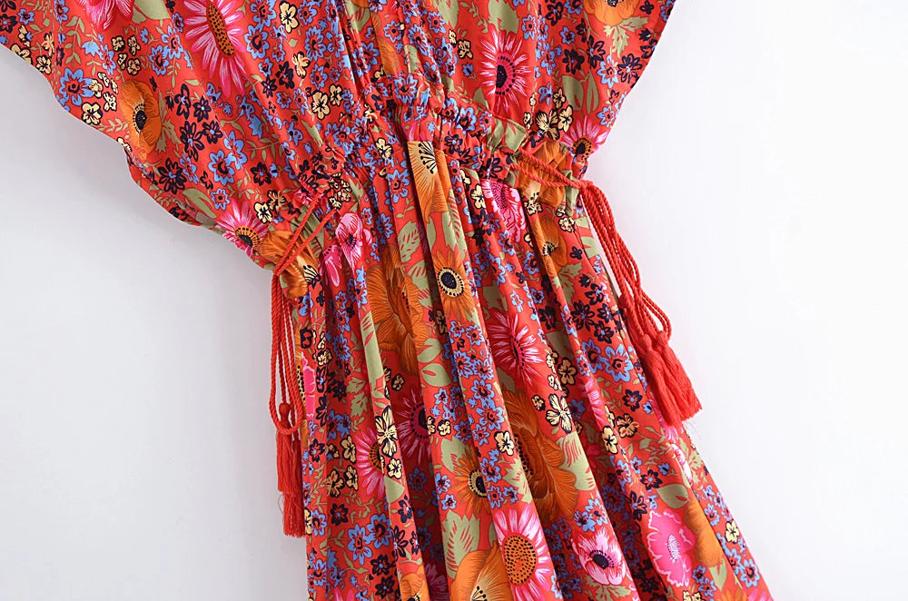 Colorful floral dress with a white background