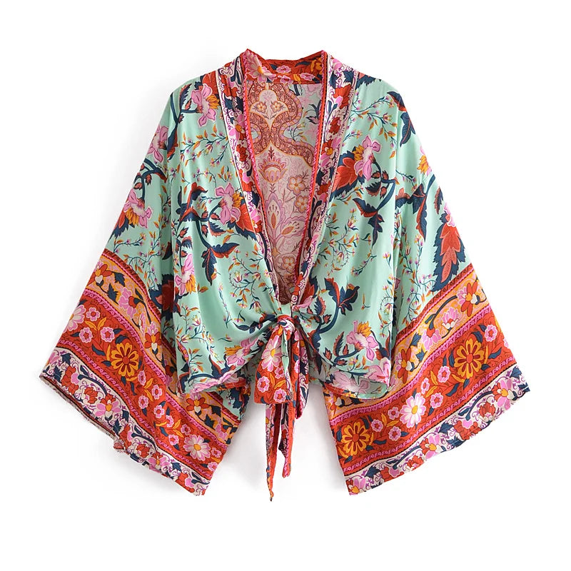 Colorful floral kimono-style jacket on a white background