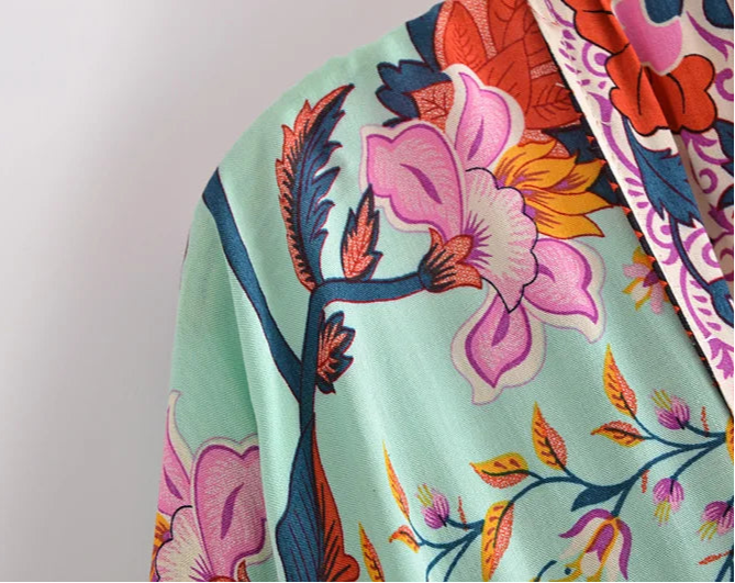 Colorful floral pattern on a light green background