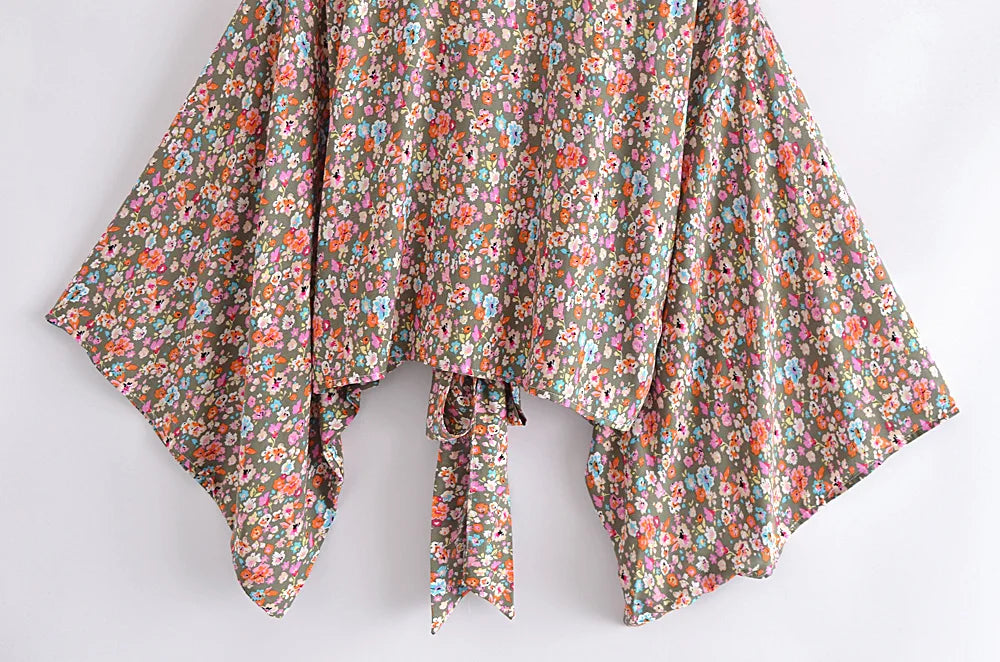 Floral patterned fabric draped over a white background