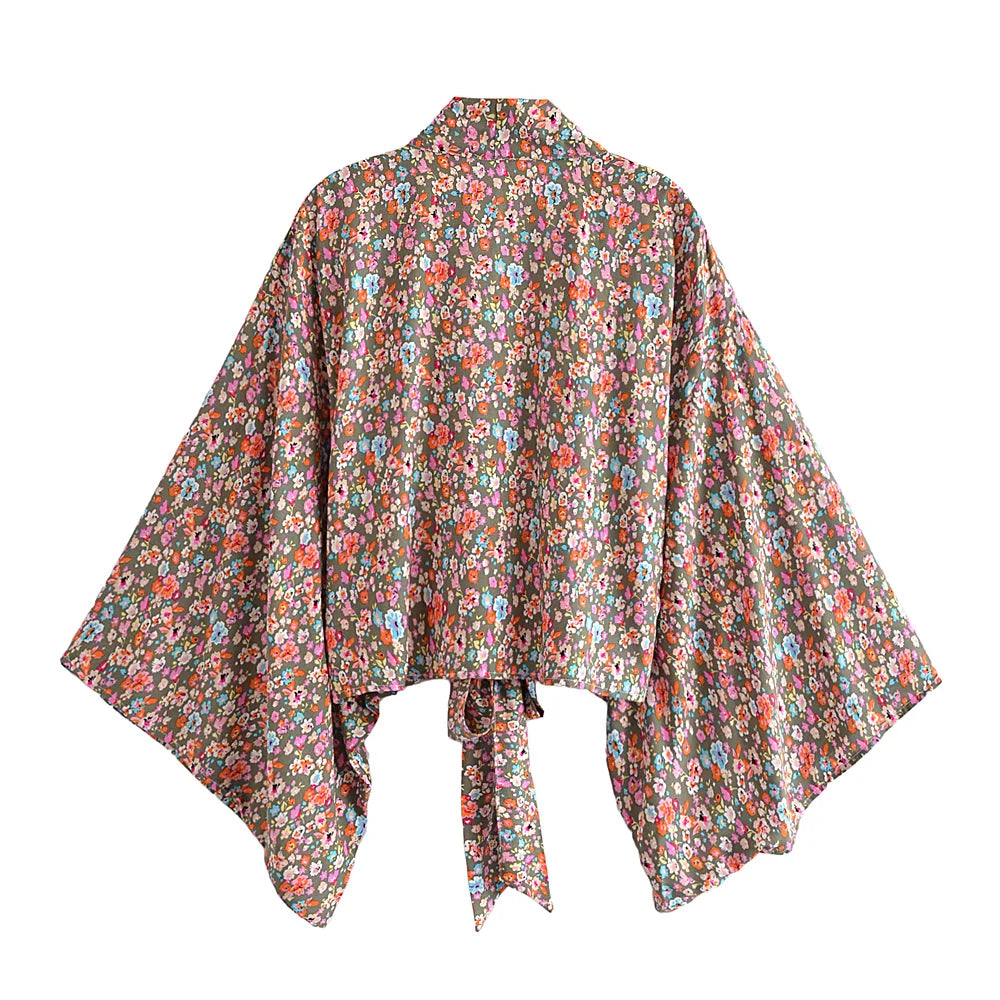 Floral patterned kimono-style garment on a white background