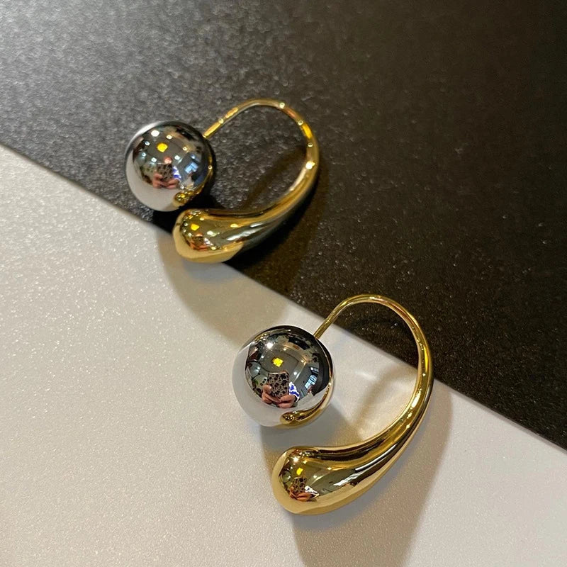 Gold and silver earrings 