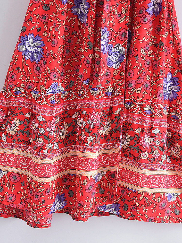 Red floral patterned fabric on a white background