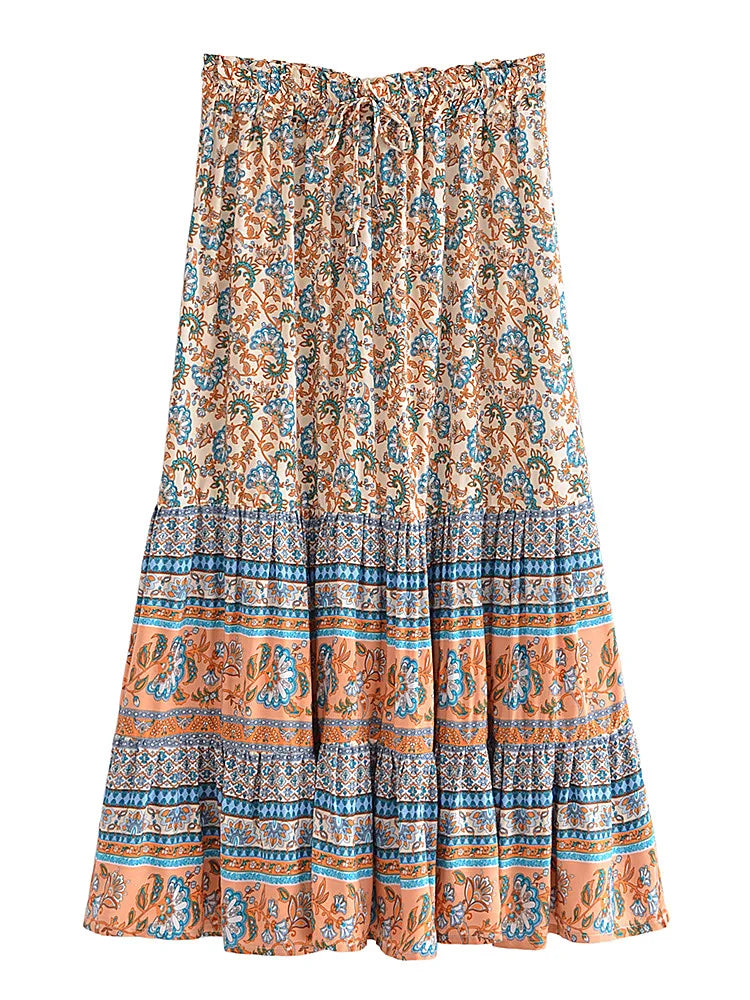 Long patterned skirt with orange and blue design on a white background
