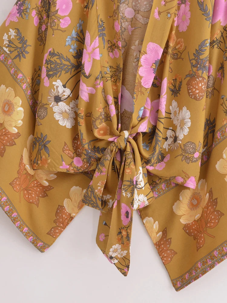 Floral patterned fabric with a tie on a white background