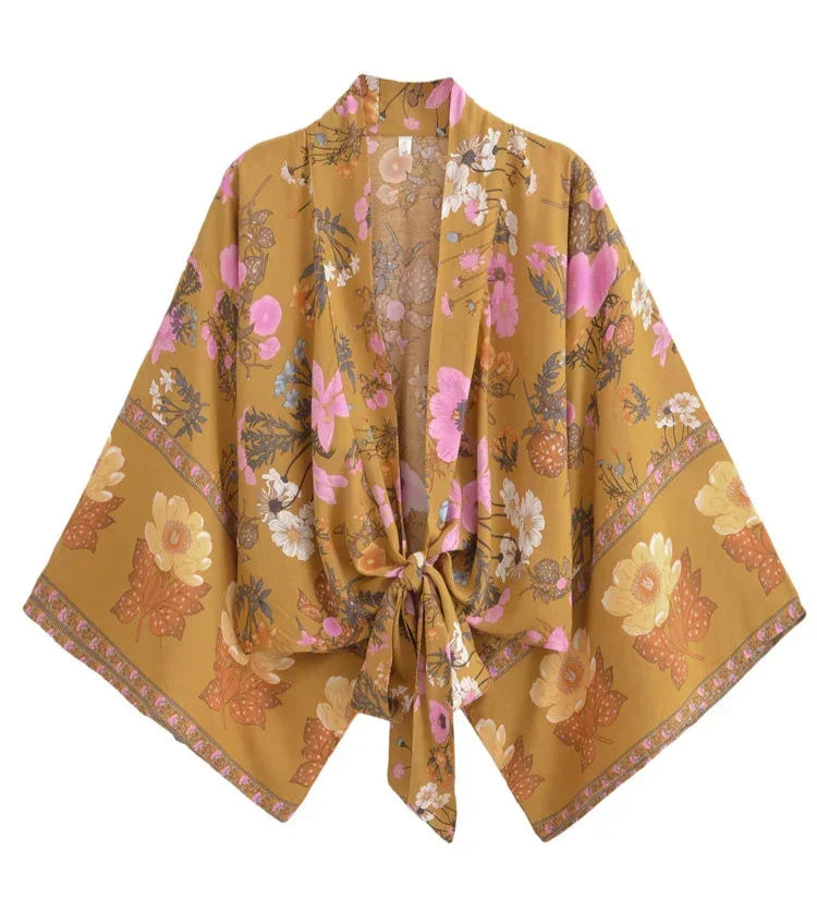 Floral patterned kimono-style garment on a white background