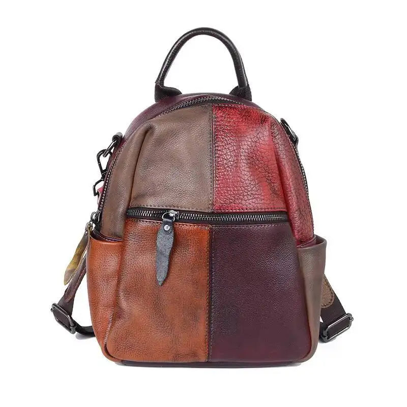 Multicolored leather backpack on a white background
