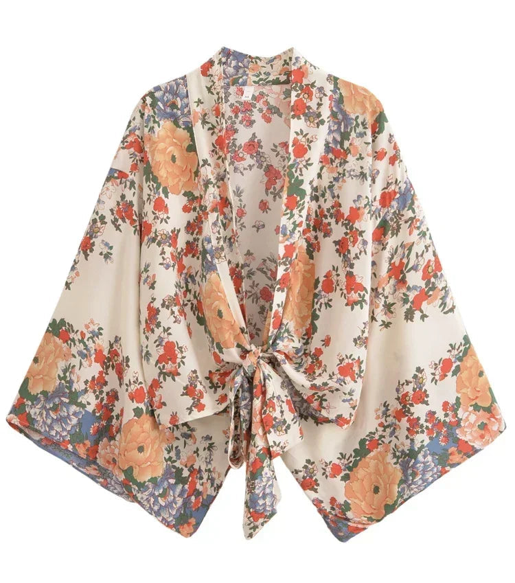 Floral kimono-style jacket on a white background
