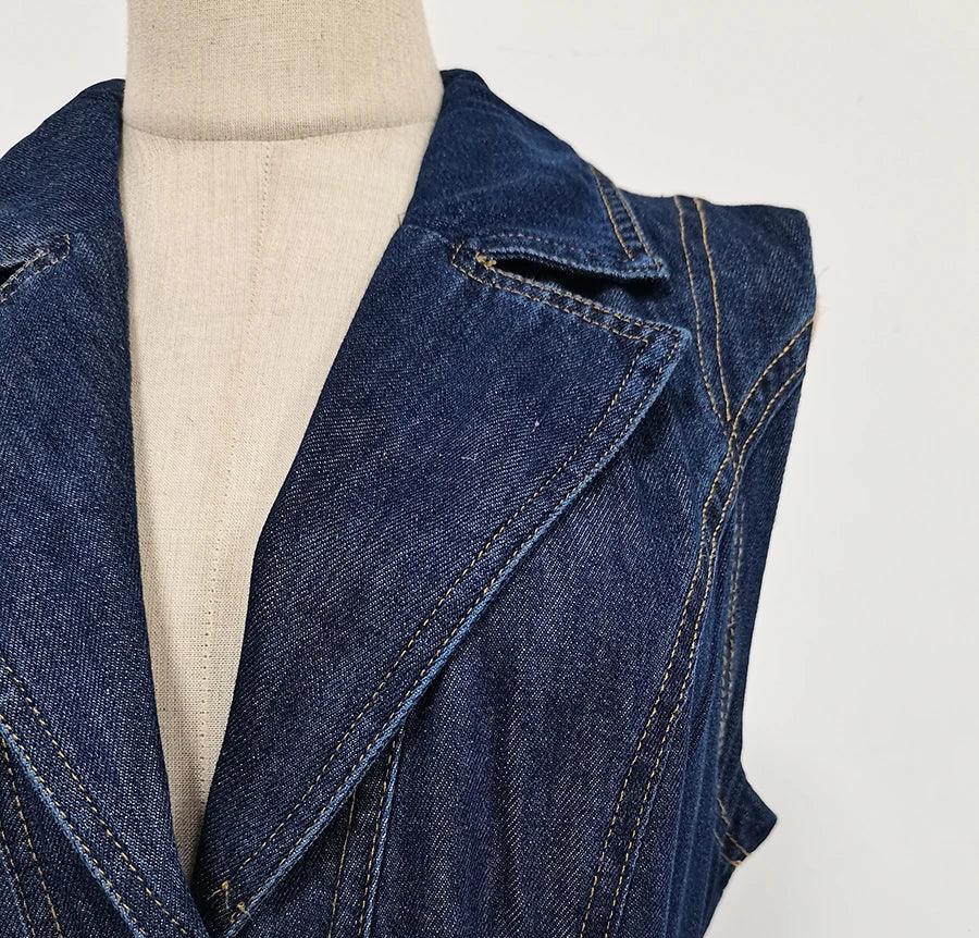 Blue denim vest on a mannequin against a white background