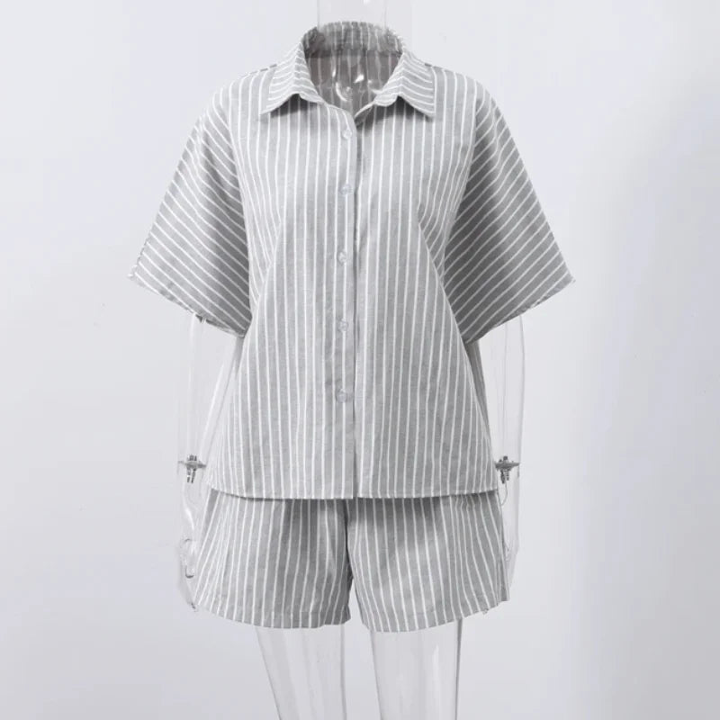 Striped shirt and shorts set on a white background
