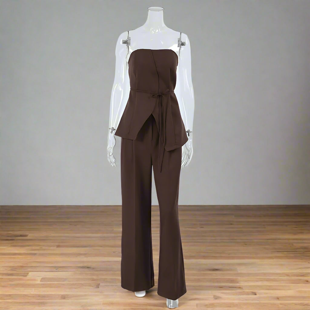Brown strapless jumpsuit on a mannequin against a white background