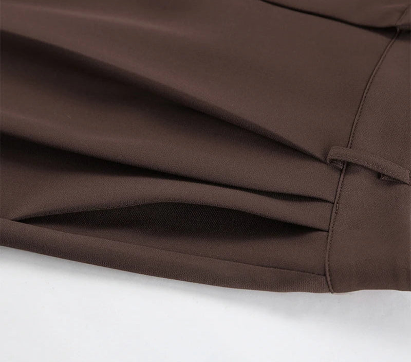 Close-up of brown fabric with a white background