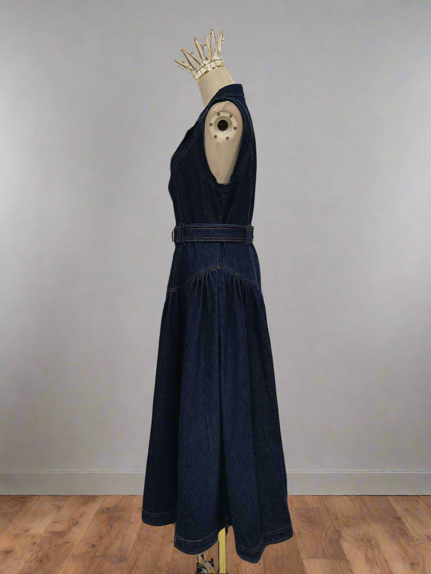 Navy blue dress on a mannequin against a plain background