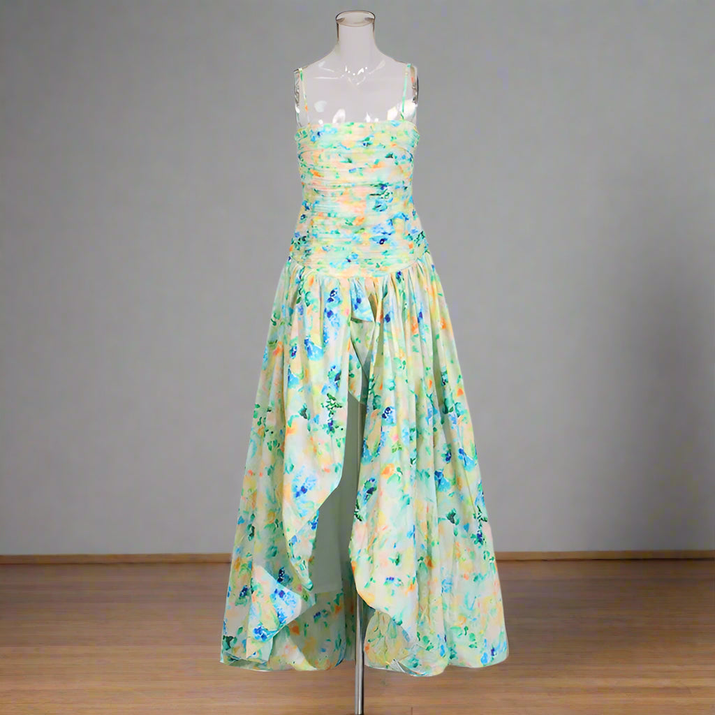 Floral dress on a mannequin against a plain background