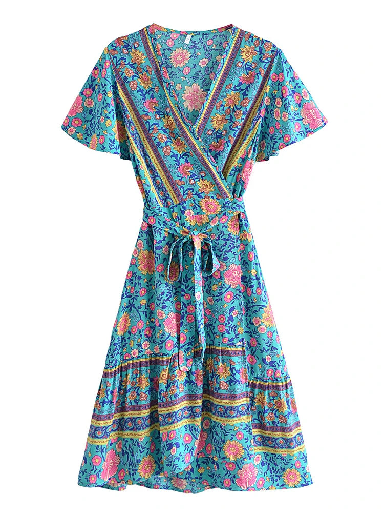 Colorful floral dress with a belt on a white background