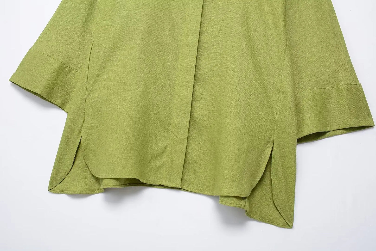 Green fabric on a white background