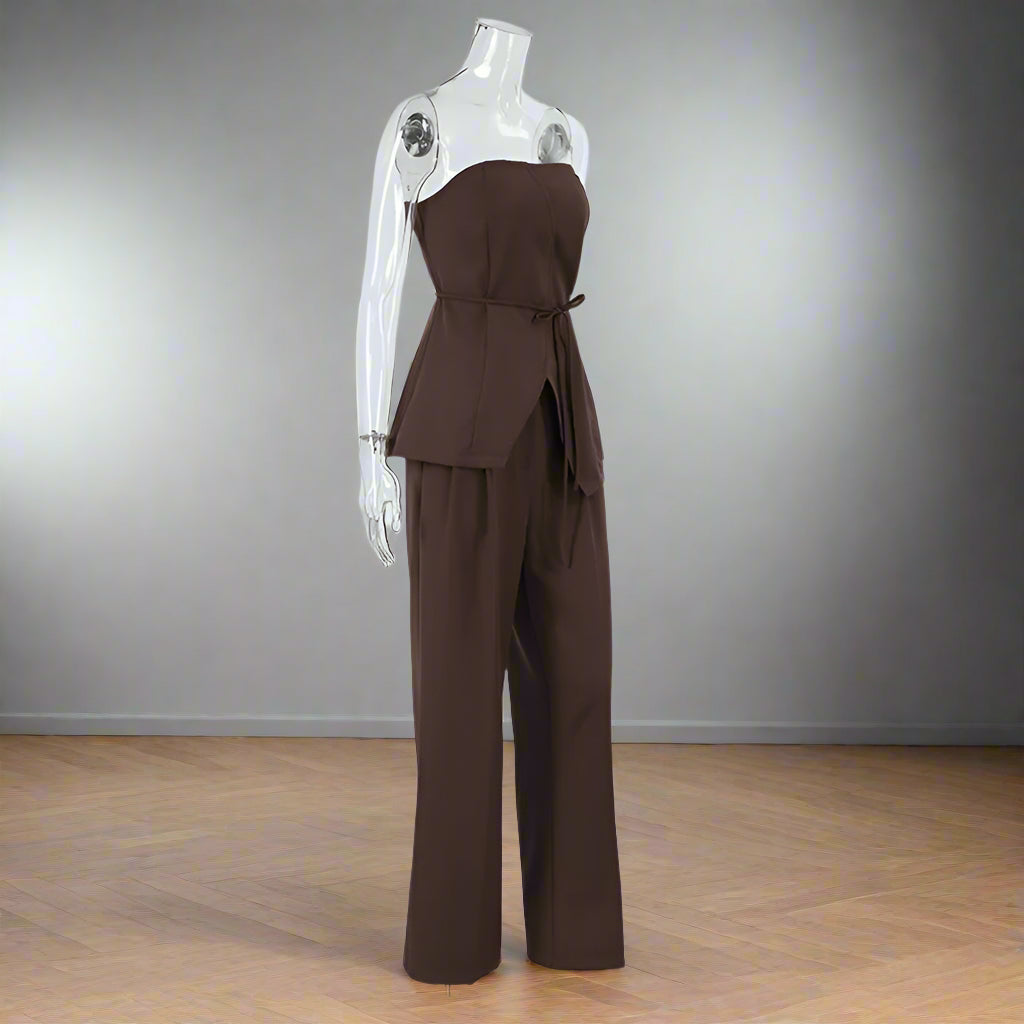Brown strapless jumpsuit on a mannequin against a white background