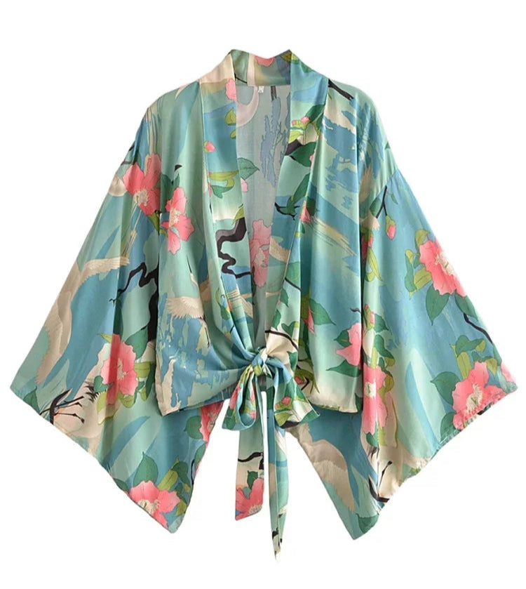 Floral kimono-style jacket on a white background