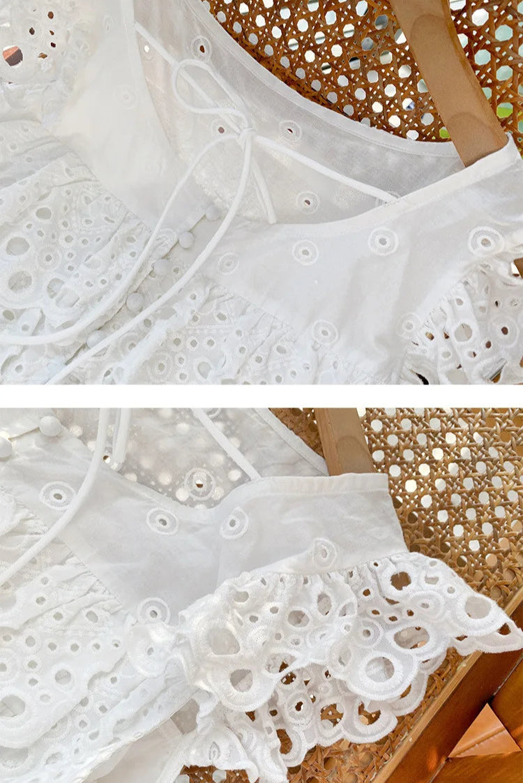 Close-up of white lace fabric on a wooden surface