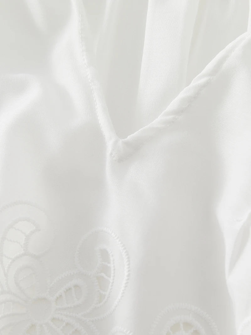 Close-up of white fabric with subtle texture