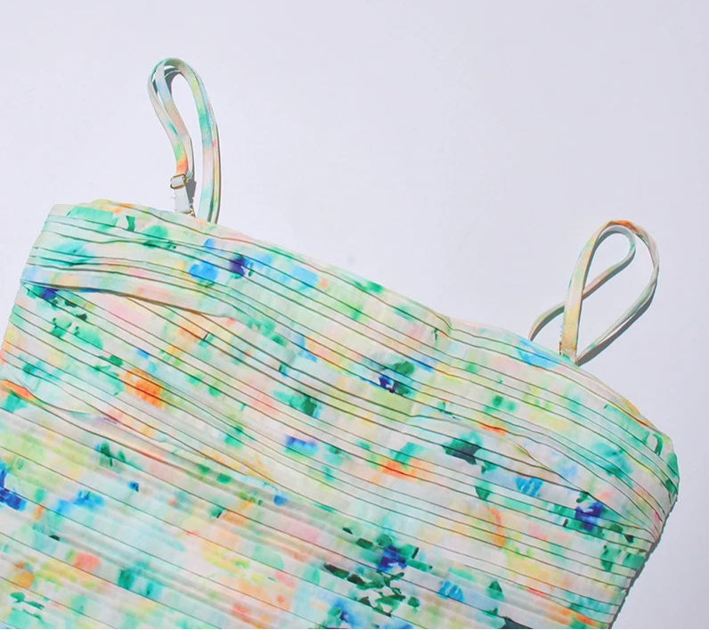 Colorful pleated top on a light gray background