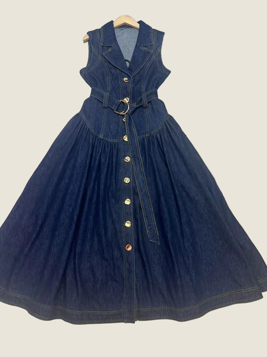 Denim dress with buttons on a tiled floor
