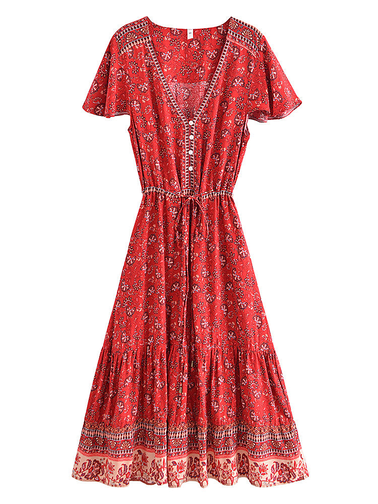 Red patterned dress on a white background