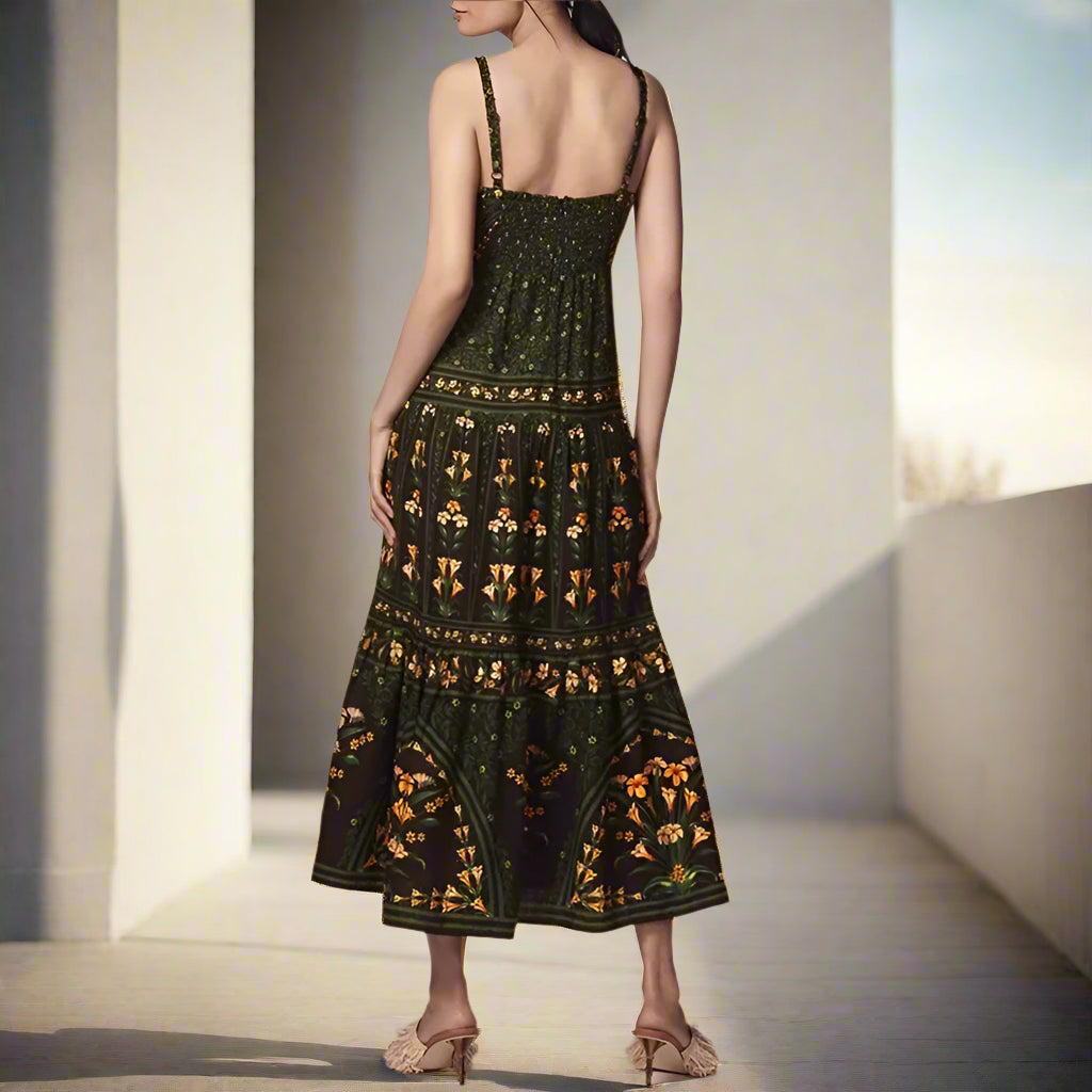 Woman wearing a green and black patterned dress on a beige background