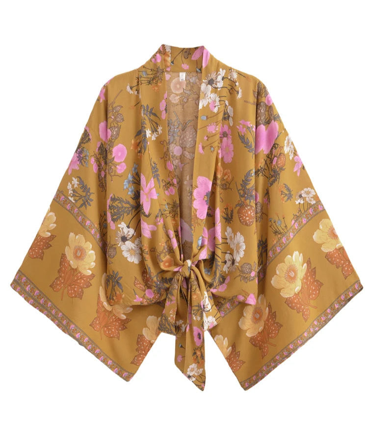 Floral patterned kimono-style garment on a white background