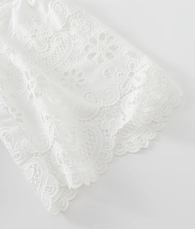 White lace fabric on a light gray background
