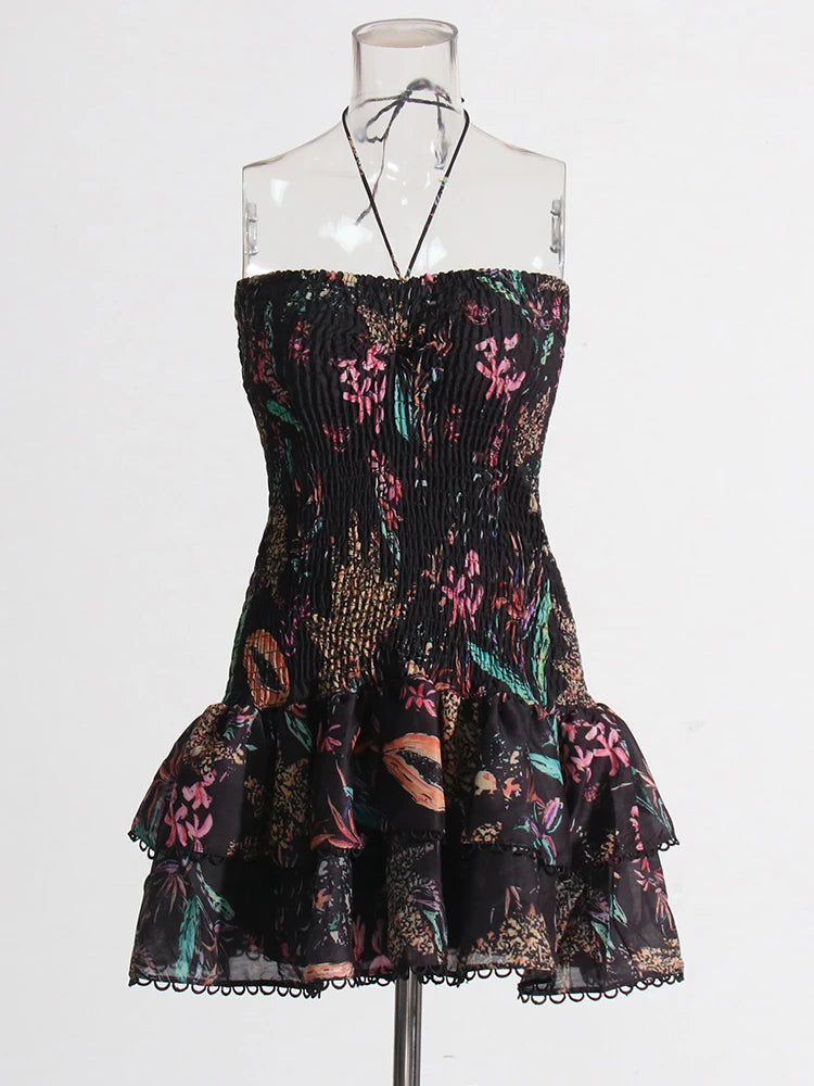 Multicolored strapless dress on a mannequin against a white background