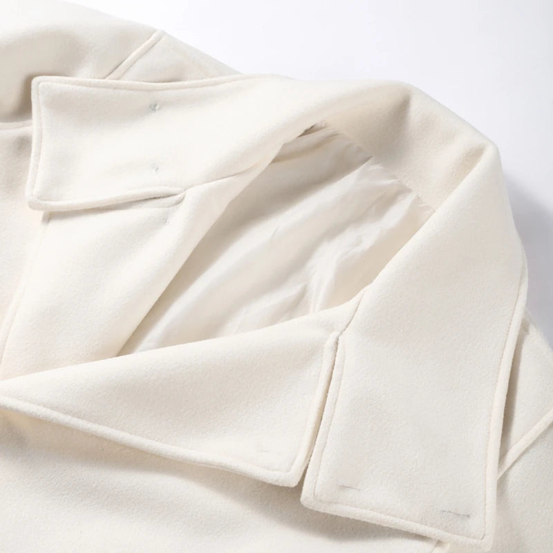 Close-up of a white fabric texture on a light background