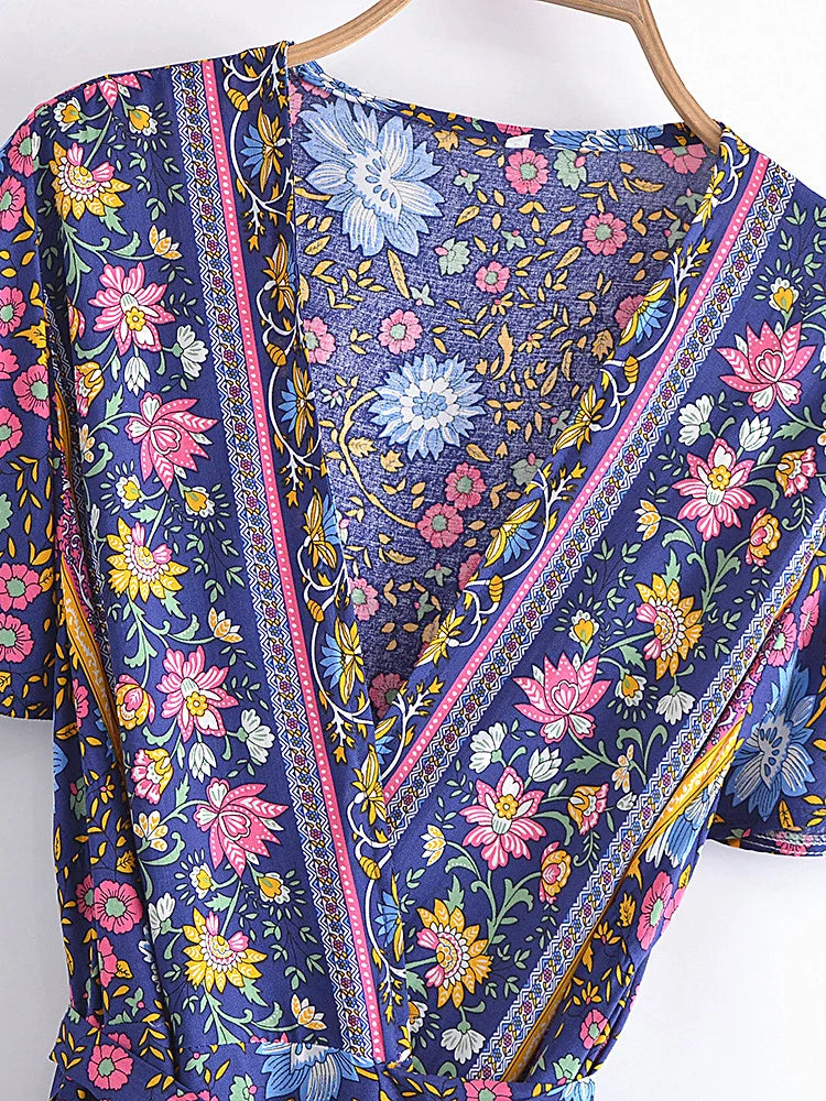 Floral patterned fabric on a hanger with a white background