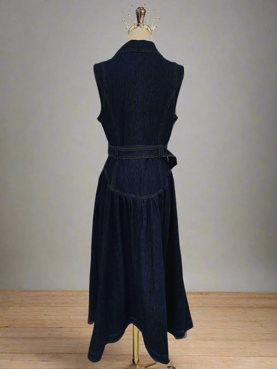 Dark blue dress on a mannequin against a white background