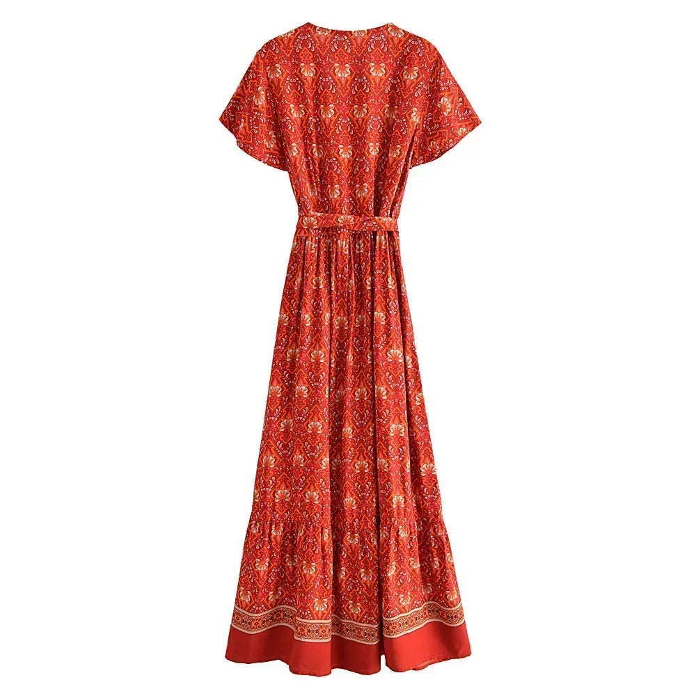 Red patterned dress on a white background