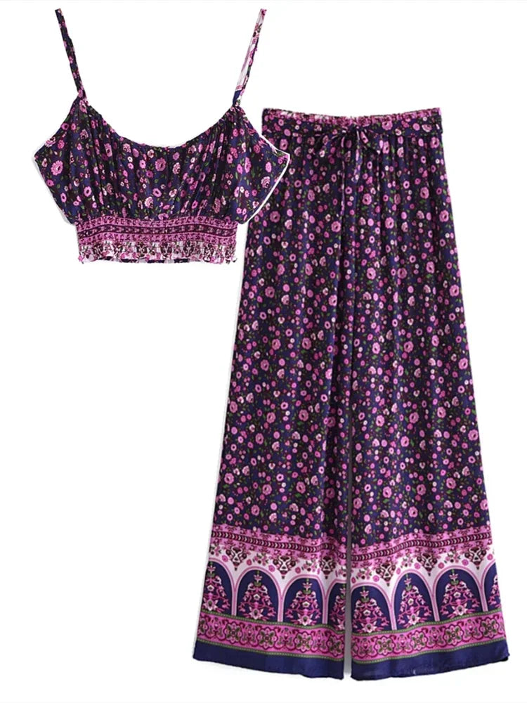 Purple floral two-piece set with top and long skirt on a white background