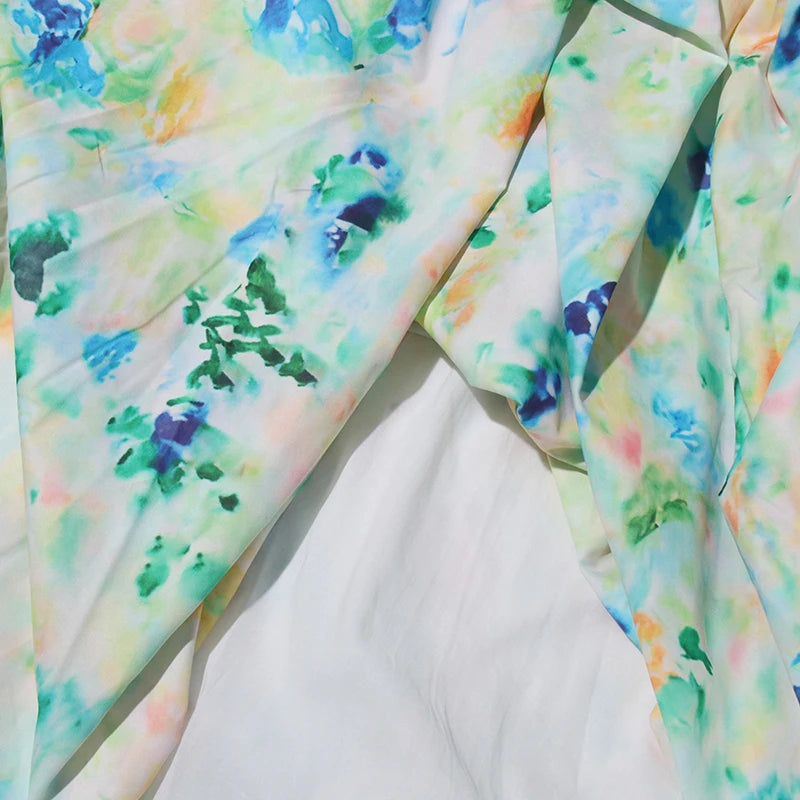 Colorful watercolor patterned fabric on a white background