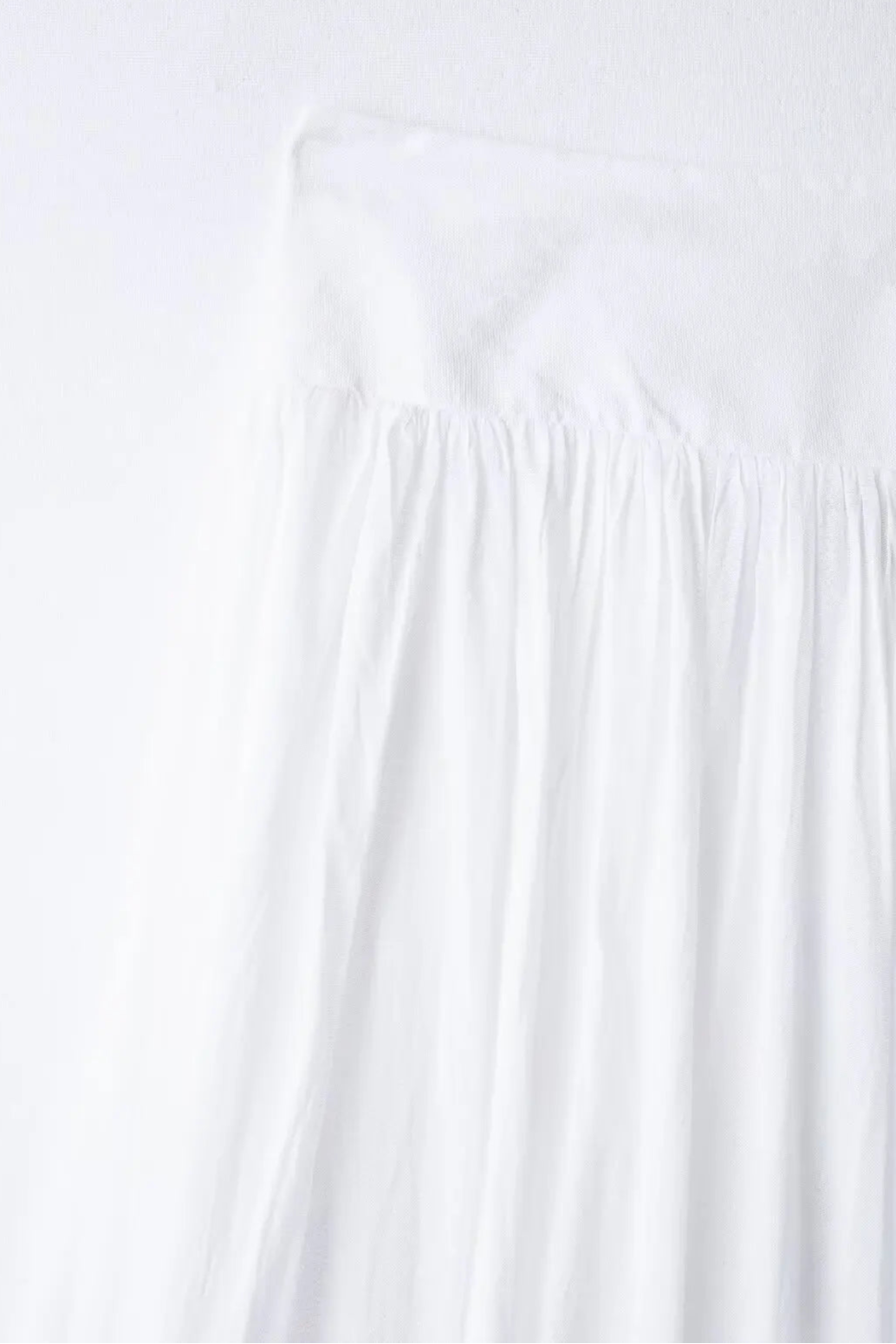 White strapless dress on a white background