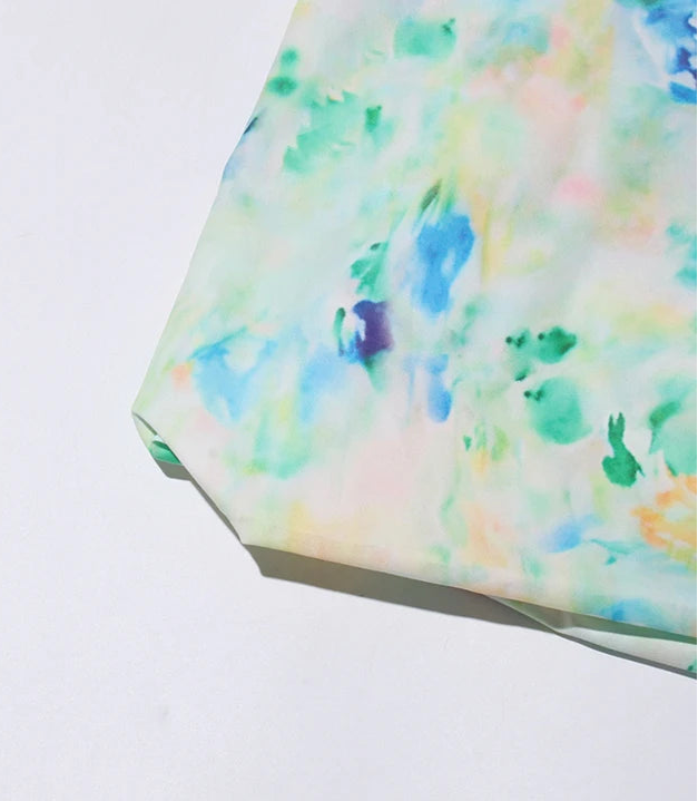 Colorful watercolor pattern on a white background