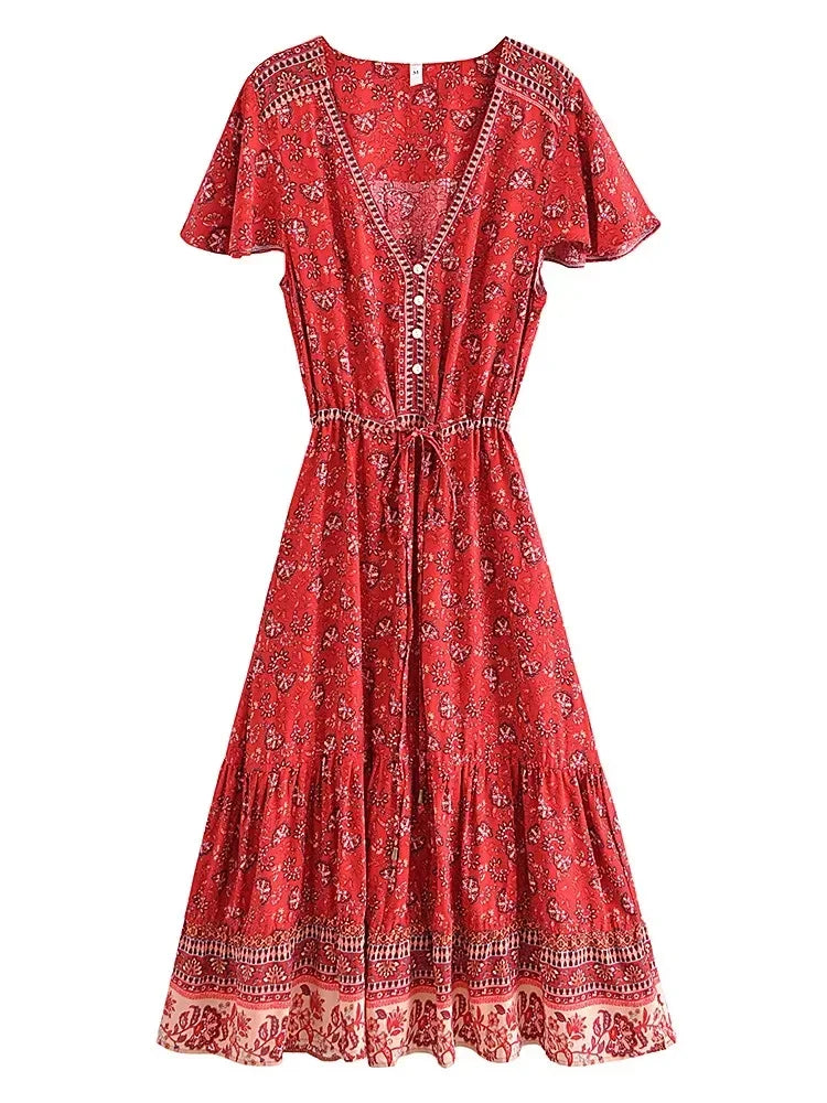 Red patterned dress on a white background