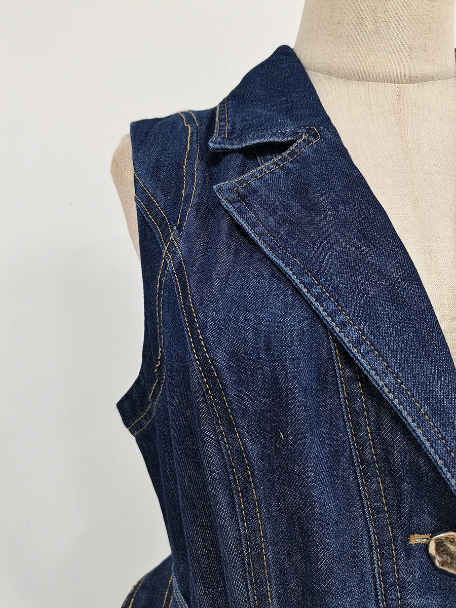 Blue denim vest on a mannequin against a plain background