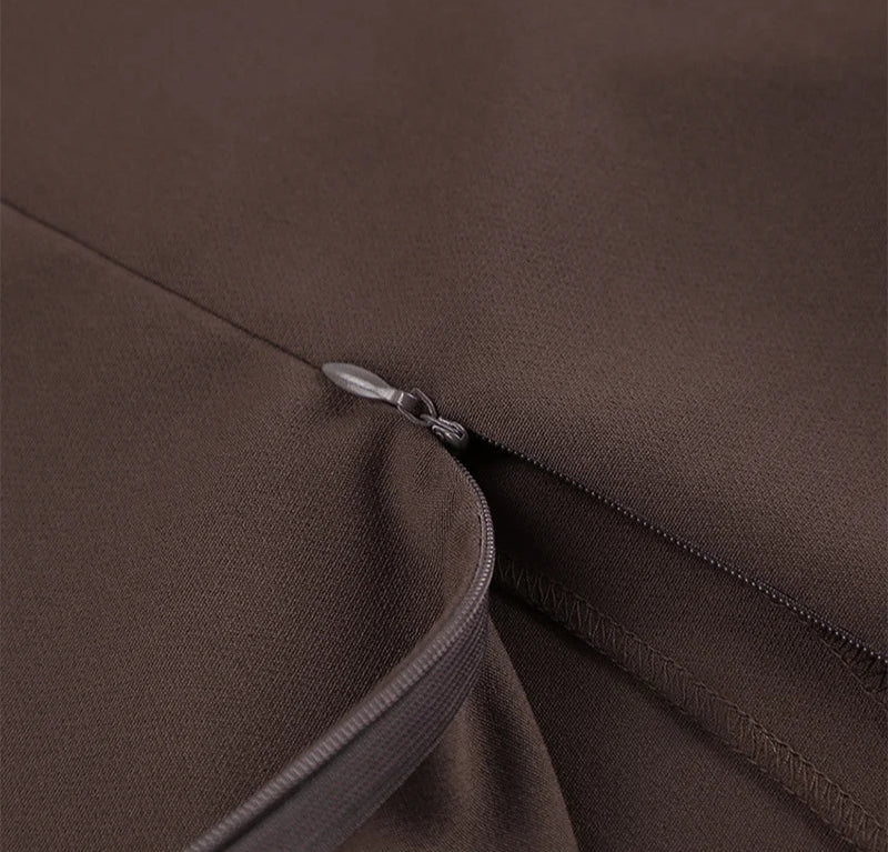 Close-up of a brown fabric with a zipper detail