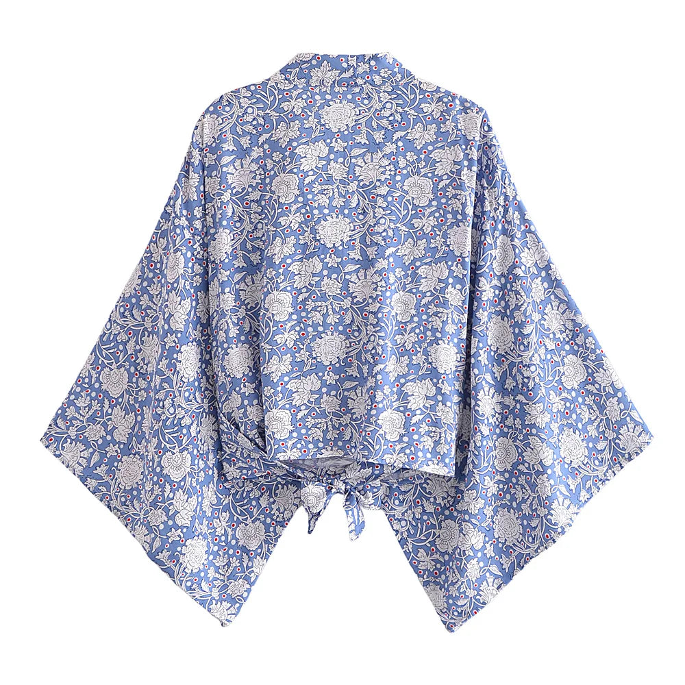 Blue floral patterned kimono on a white background