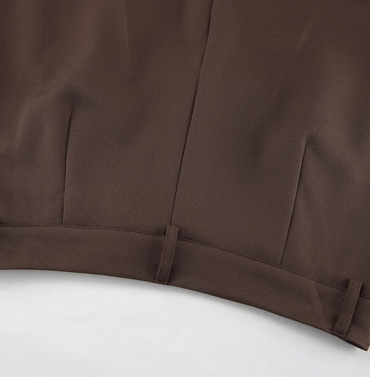 Brown fabric with a subtle texture on a white background