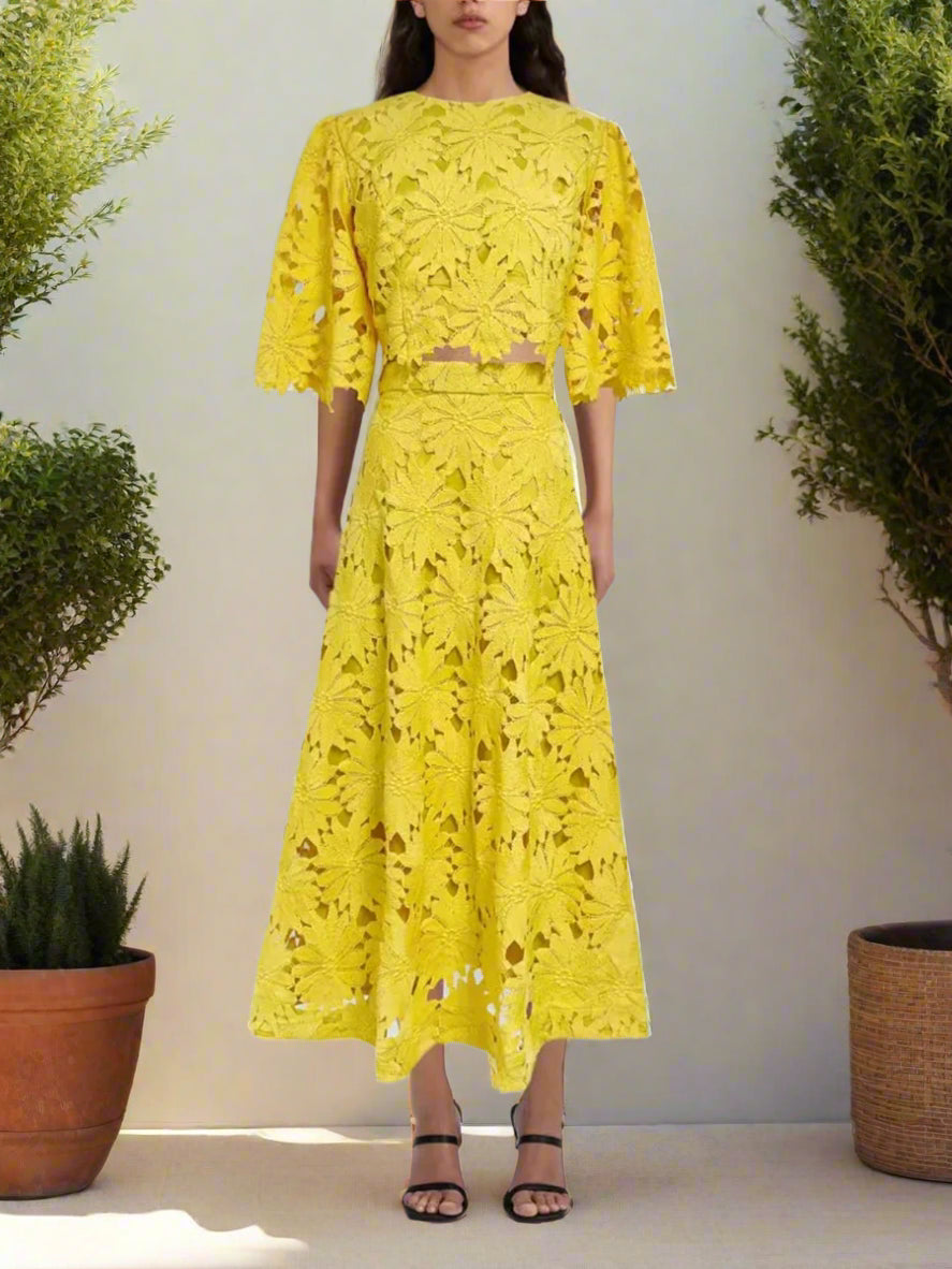 Yellow lace outfit set on a white background