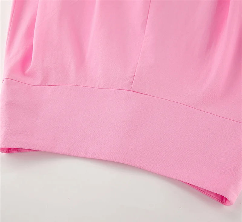 Close-up of a pink garment on a light gray background