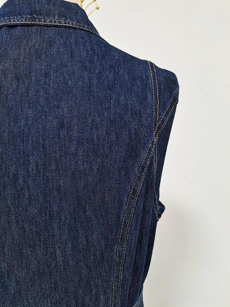 Blue denim vest on a mannequin against a white background