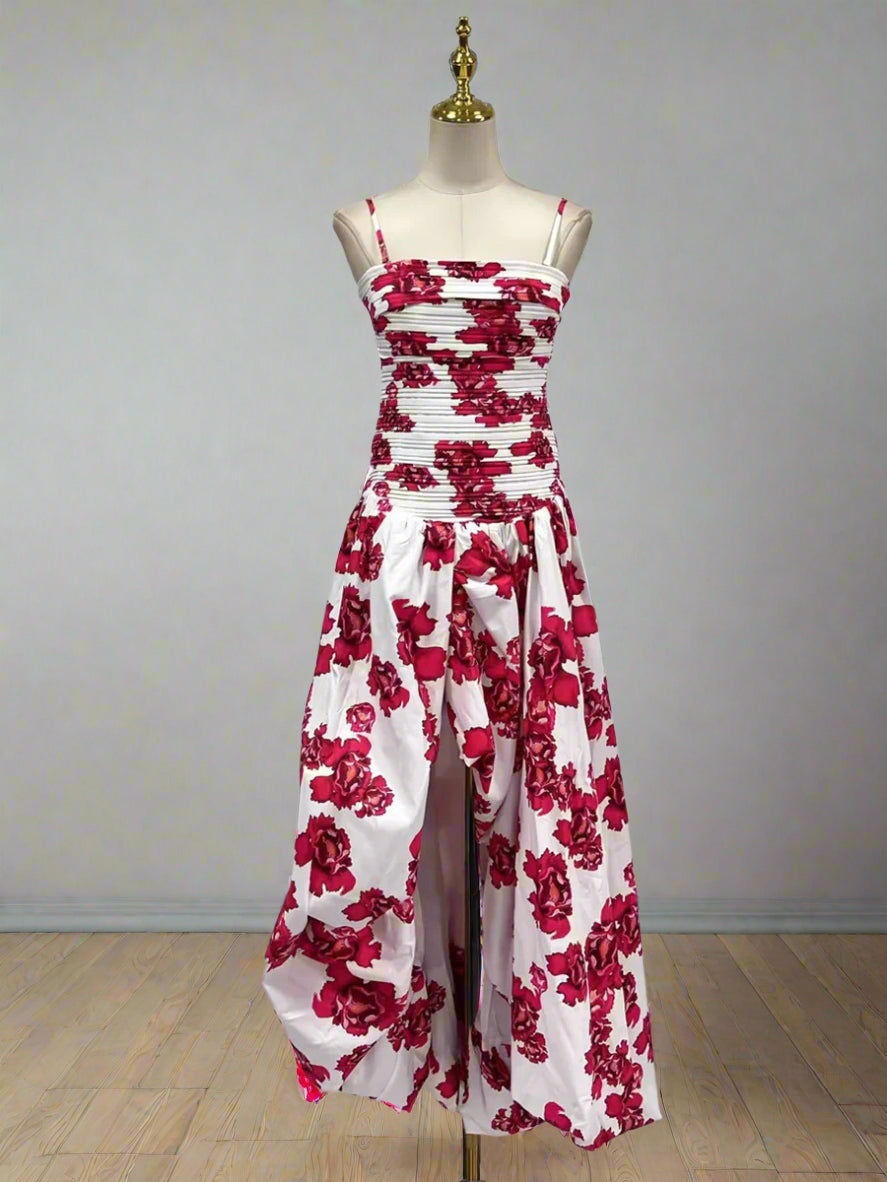 Red floral dress on a mannequin against a white background