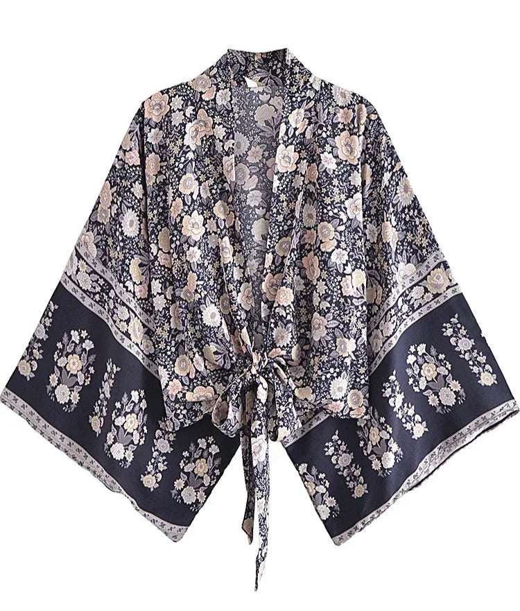 Floral patterned kimono-style garment on a white background